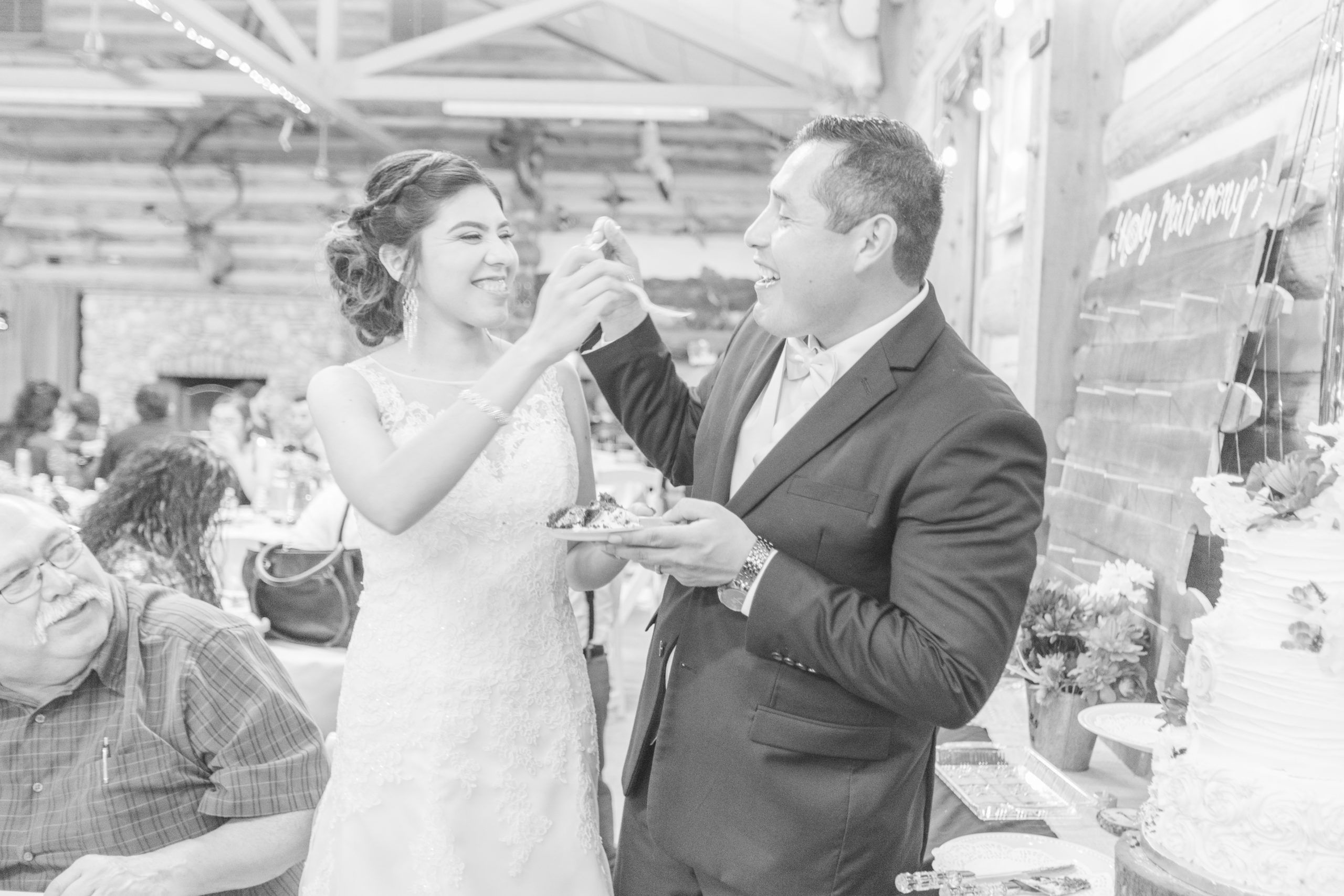 navy-burgundy-sportsmens-club-wedding-briana-chris reception cake cutting