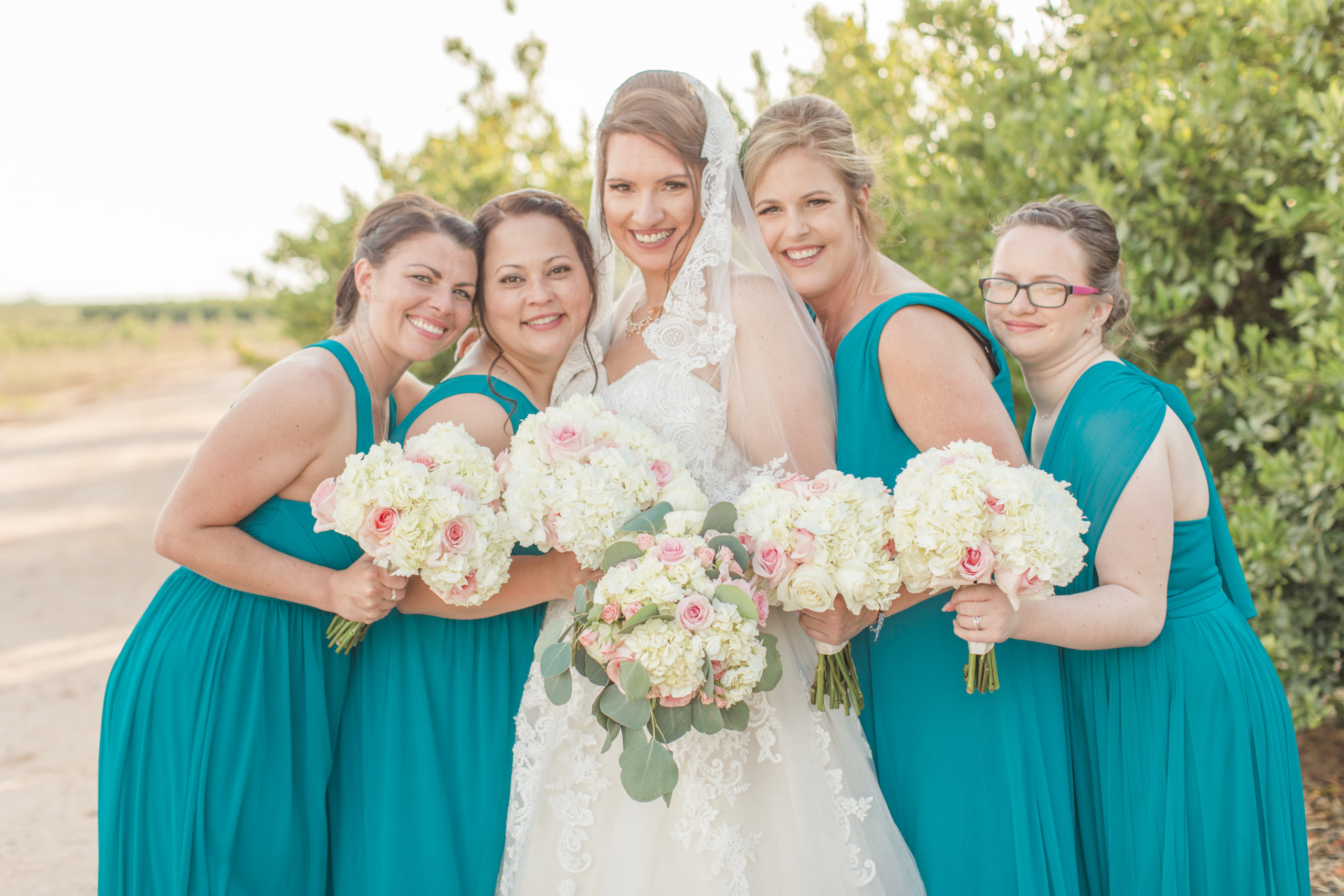 A teal Branch and Vine Wedding wedding party