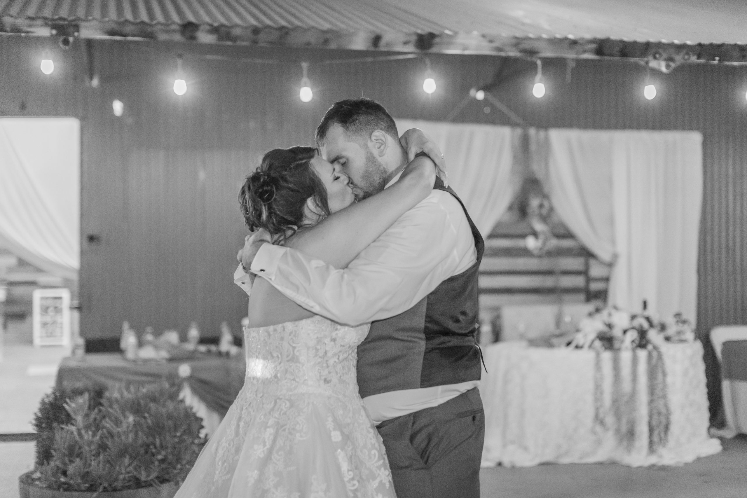 A teal Branch and Vine Wedding first dance