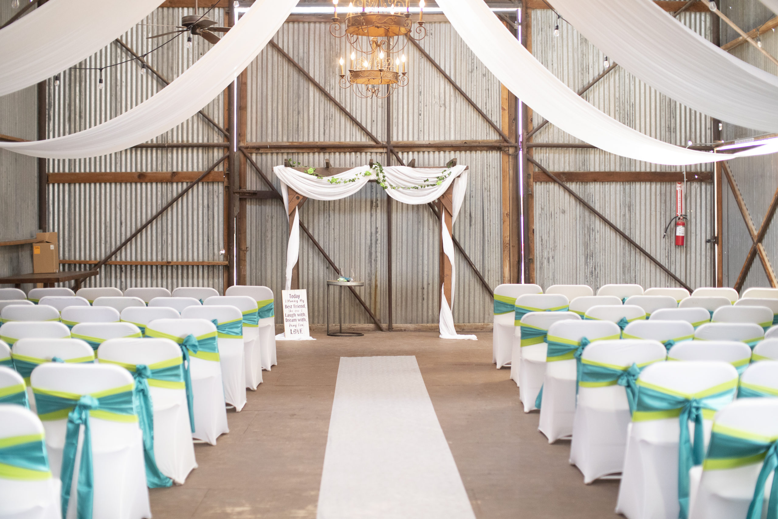 A teal Branch and Vine Wedding ceremony