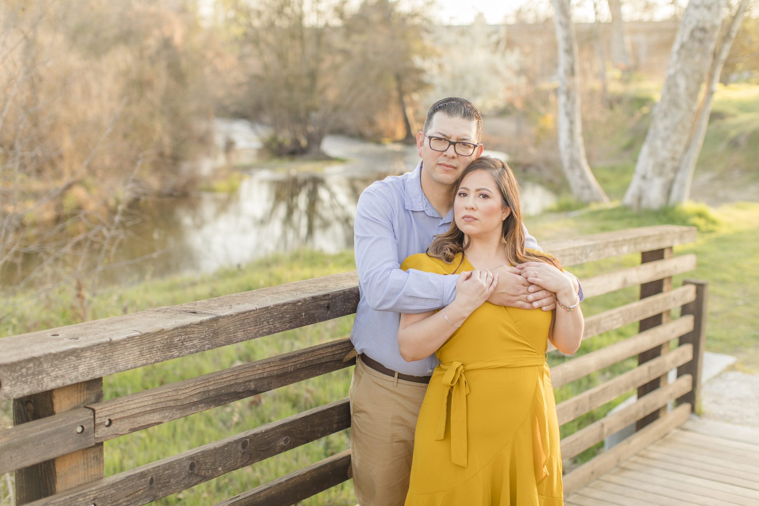 engagement couple on bridge