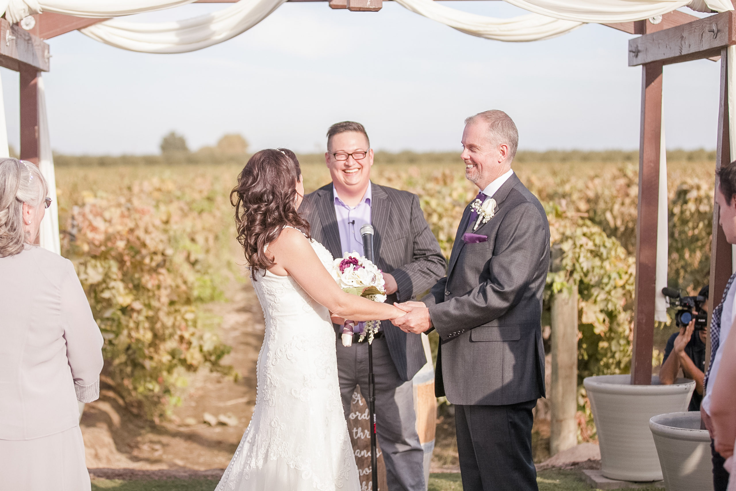 bride and groom saying vows