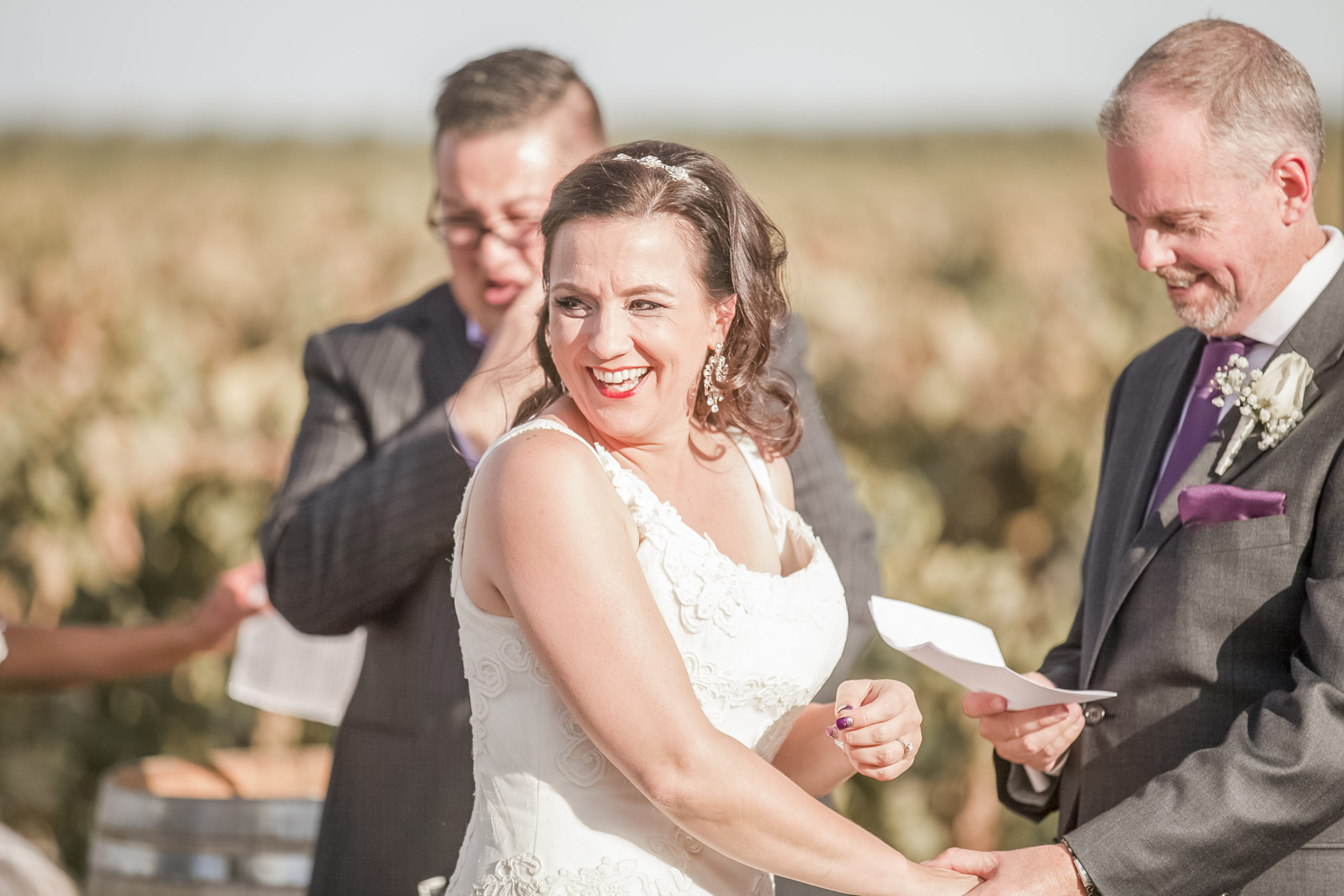 bride and groom saying vows