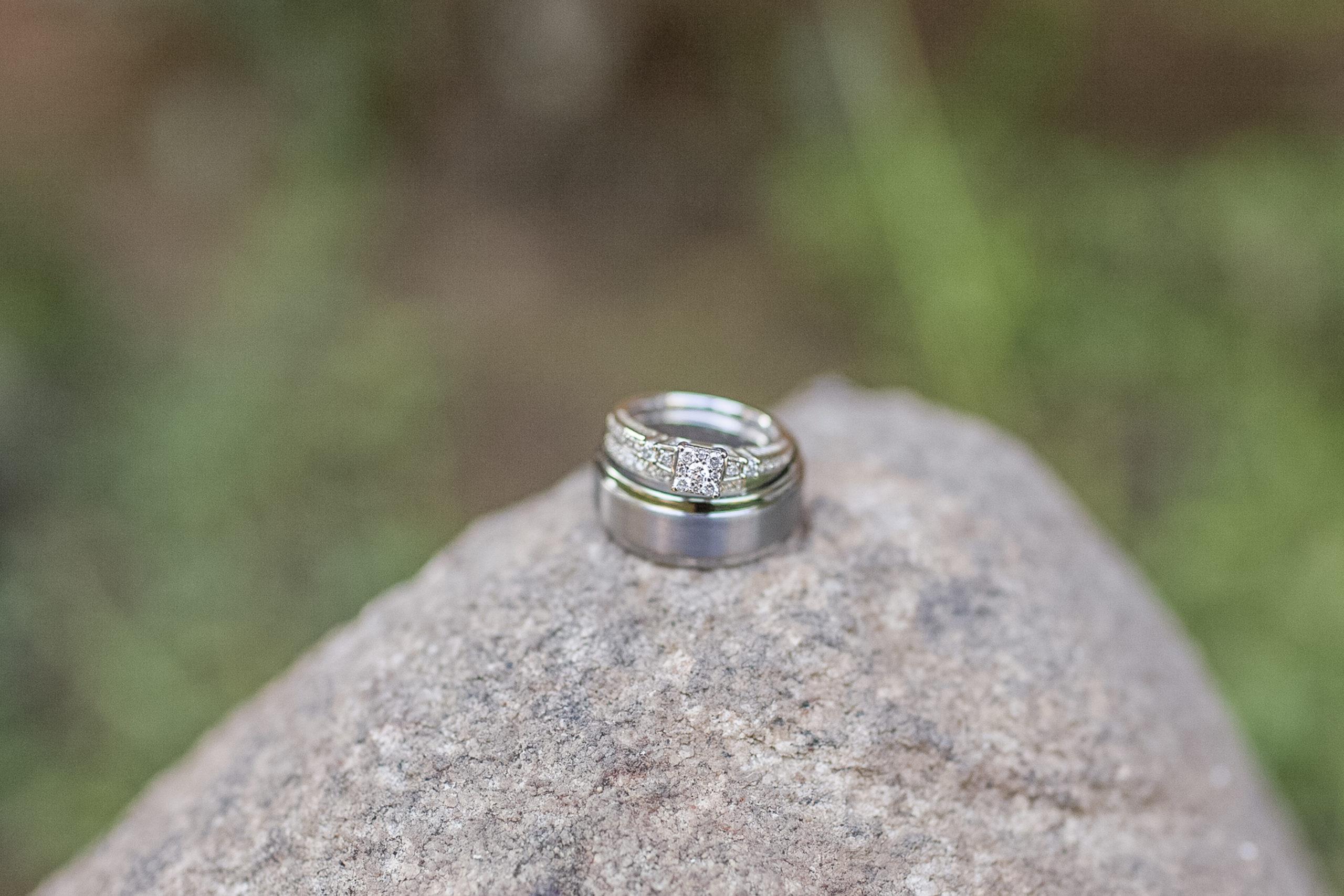 wedding rings on rock