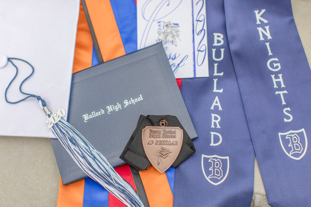 high school diploma and tassle