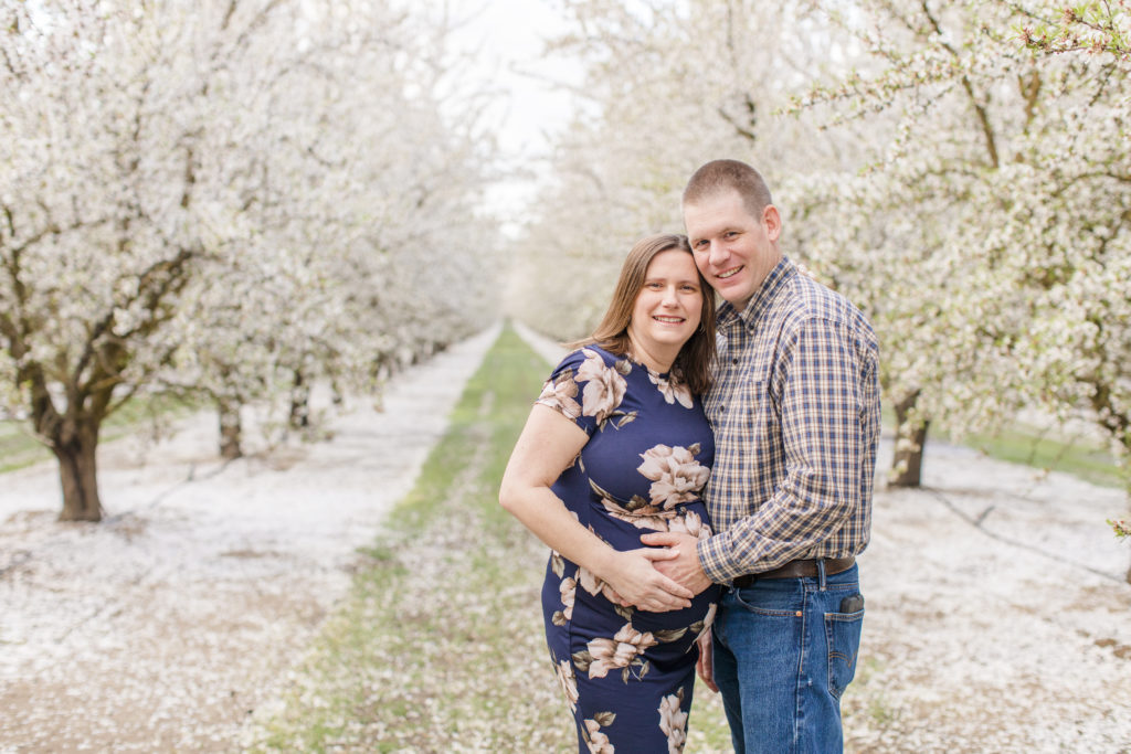 couple in an orchard